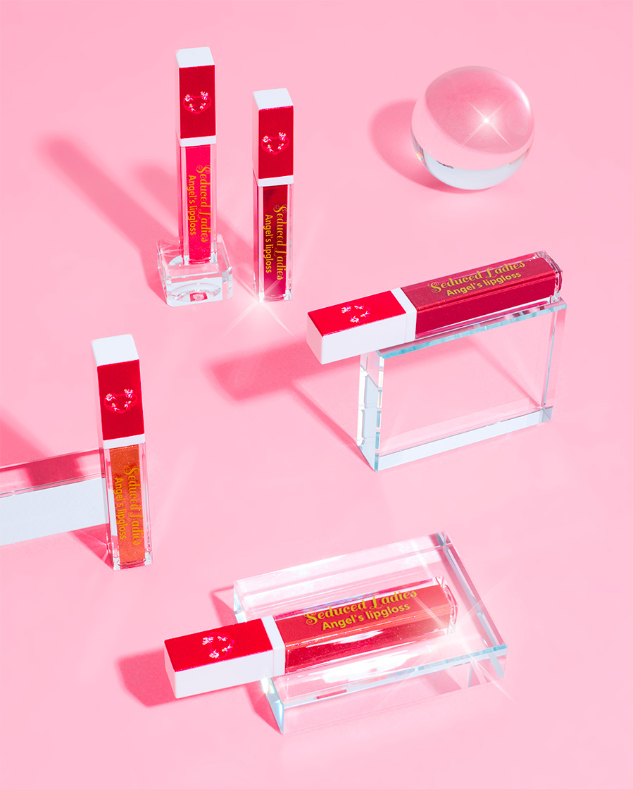 photographie produit gloss glitter rose make up rouges à lèvres photographe cosmétique verre