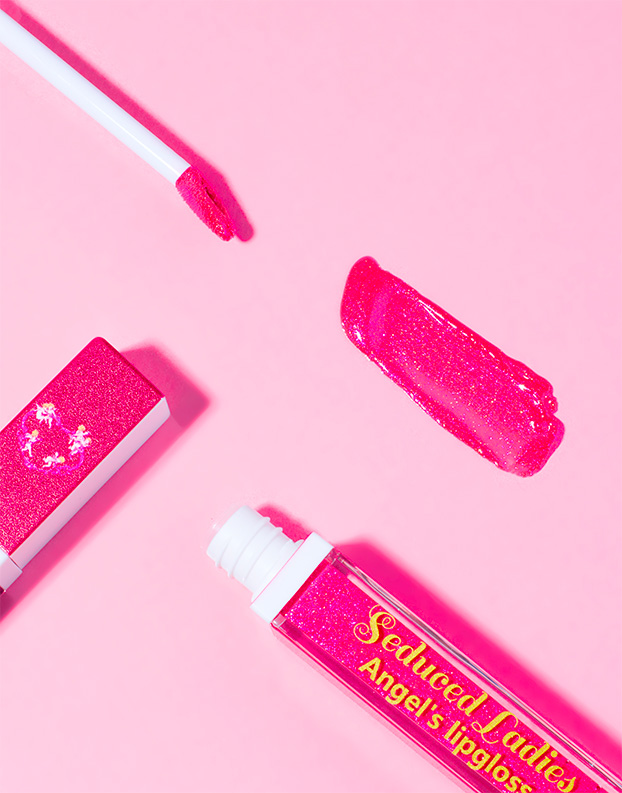 photographie produit gloss glitter rose make up rouges à lèvres photographe cosmétique texture