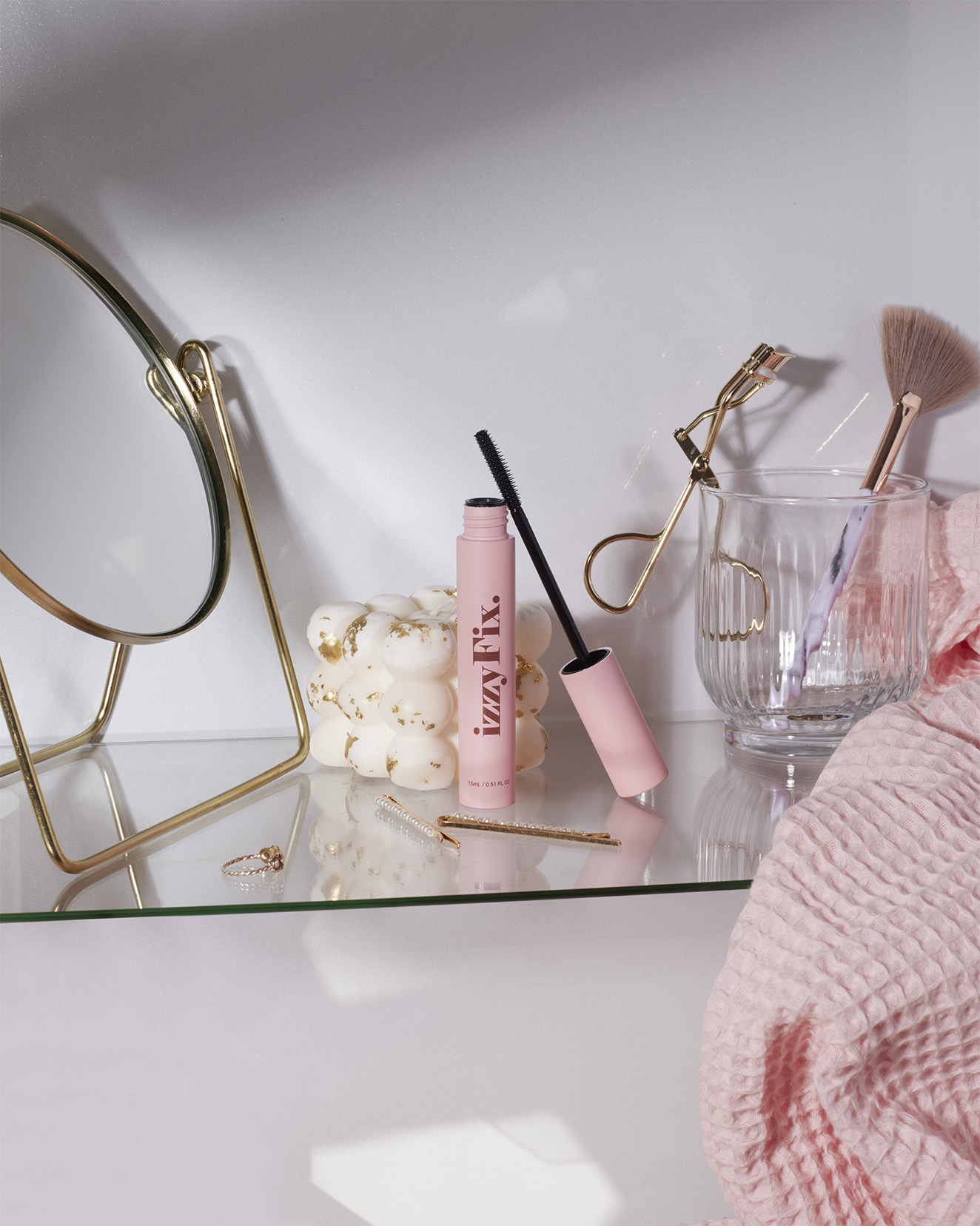 mascara photographie produit cosmétique rose izzyfix