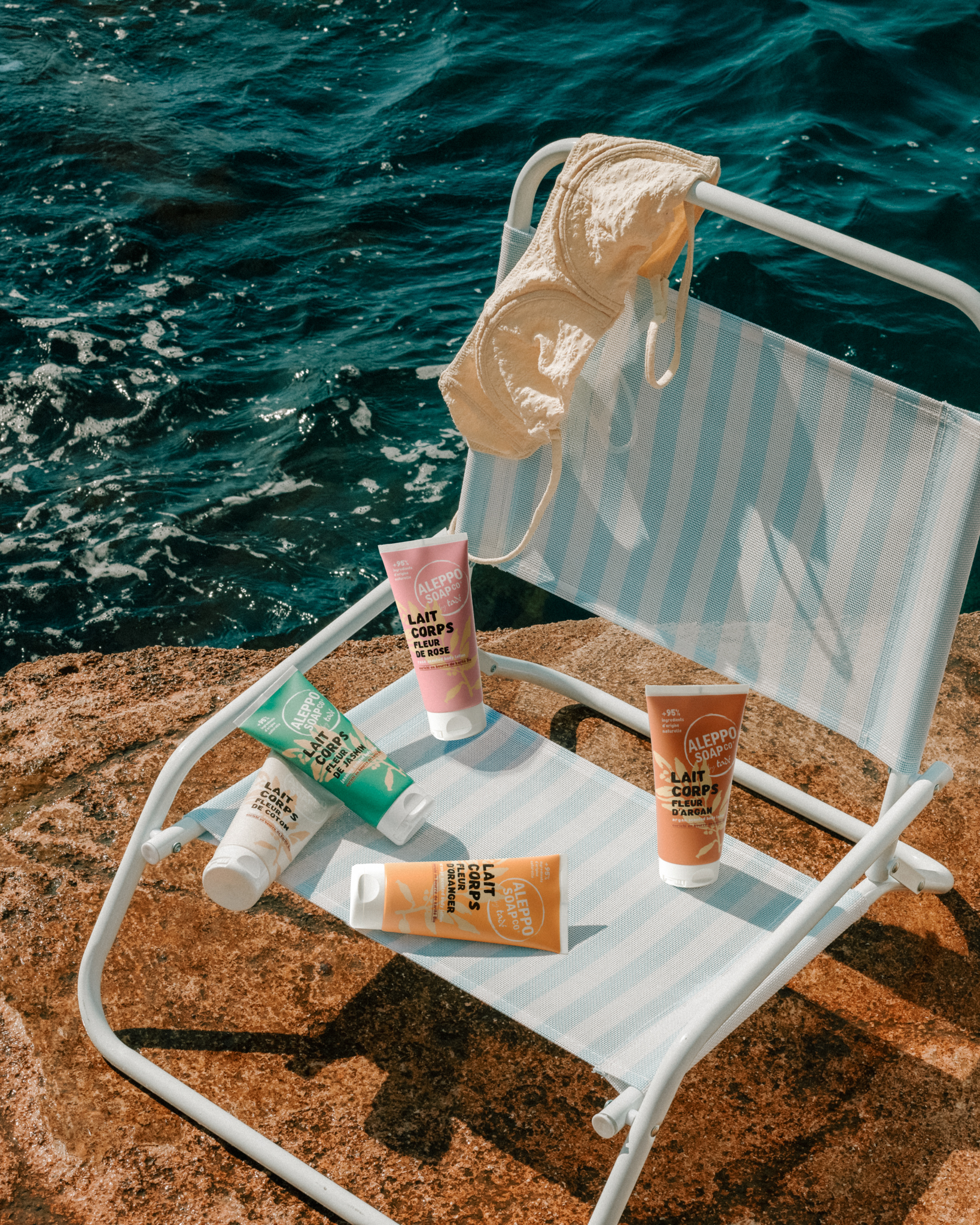 Tadé Méditerranée creme solaire plage photographe marseille chaise de plage photographie produit bronzer
